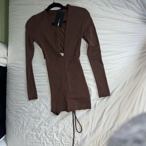 BRAND NEW FASHIONNOVA
“Second To None Romper”
Brown
SIZE XS